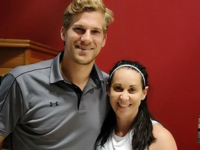 Kim Brouzes of Active Therapy Plus with NHLer Marcus Foligno.