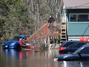 This was the scene on Horseshoe Lane in Katrine two years ago when massive flooding hit the small Hamlet in Armour Township.  Mayor Bob MacPhail says it was common to see front yards drenched in three to four feet of water.  MacPhail hopes the region can avoid any flooding this spring.
Dave Gray Photo