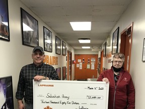 Sheldon Downie, Director of Operations and General Manager at LaPrairie Works  Oilfield Services (left), Margaret Davie, Community Ministries Coordinator, Peace River Salvation Army (right). Since 1986 LaPrairie Group has raised over $280,000 for the Salvation Army (in addition to other charitable/community initiatives: community beautification projects, tree-planting, minor hockey team sponsorships etc.).