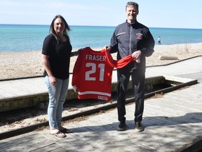 Jill Fraser, of Kincardine, was recently recognized as a Hockey Canada Champion. This honour is given to anyone who has had a significant impact on the game in their communities. Here, Jill receives her Hockey Canada jersey. SUBMITTED
