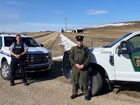 RCMP Const. Nick Wyczynski of the RCMP’s Airdrie integrated rural detachment with fish and wildlife officer Matt Michaud. Photo courtesy of the Government of Alberta.