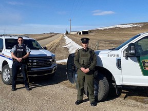 RCMP Const. Nick Wyczynski of the RCMP’s Airdrie integrated rural detachment with fish and wildlife officer Matt Michaud. Photo courtesy of the Government of Alberta.