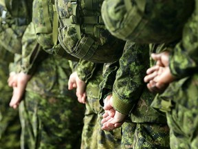 A file photo of members of the Canadian Armed Forces. PHOTO BY JULIE OLIVER / POSTMEDIA