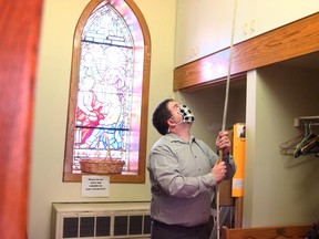 Parishioner Erik Rogers rings the bell at St. John's Anglican Church on Main Street E. 99 times, Sunday, to mark the recent death of Prince Philip. Michael Lee/The Nugget