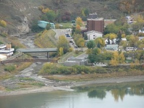 •	IMG_ 000.00 – View from Misery Mountain shows approximate area at the confluence of Heart and Peace rivers where David Thompson was said to have camped in the early 1800s. Note: three bridges over the Heart River. The pedestrian bridge leads to the Peace River Museum, Archives and Mackenzie Centre on the right bank of the Heart.