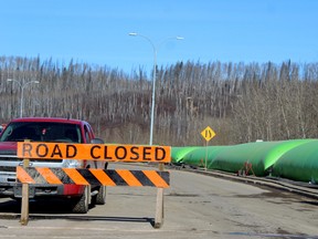 Temporary dams are set up along Prairie Loop Boulevard in downtown Fort McMurray as temporary flood mitigation on Saturday, March 27, 2021. Laura Beamish/Fort McMurray Today/Postmedia Network