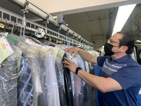 Owner of Heritage Dry Cleaners Miguel Hechavarria received a $10,000 grant from Desjardins on Wednesday, April 14 to help cover various business expenses amid dropping revenues during the pandemic. Lindsay Morey/News Staff