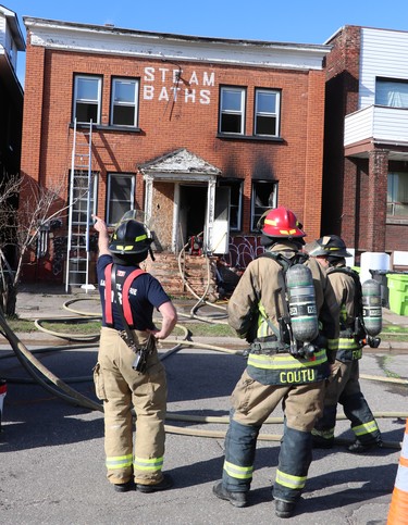 Firefighters respond to a fire at 340 Albert St. W., on Friday, April 16, 2021 in Sault Ste. Marie, Ont. (BRIAN KELLY/THE SAULT STAR/POSTMEDIA NETWORK)