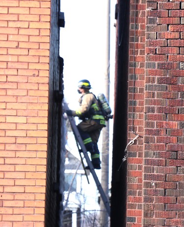 Firefighters respond to a fire at 340 Albert St. W., on Friday, April 16, 2021 in Sault Ste. Marie, Ont. (BRIAN KELLY/THE SAULT STAR/POSTMEDIA NETWORK)