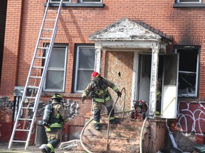 Firefighters respond to a fire at 340 Albert St. W., on Friday, April 16, 2021 in Sault Ste. Marie, Ont. (BRIAN KELLY/THE SAULT STAR/POSTMEDIA NETWORK)