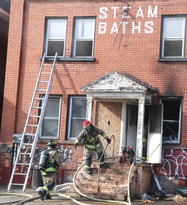 Firefighters respond to a fire at 340 Albert St. W., on Friday, April 16, 2021 in Sault Ste. Marie, Ont. (BRIAN KELLY/THE SAULT STAR/POSTMEDIA NETWORK)