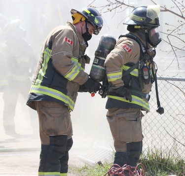 Firefighters battle fire at 93 North St., in Sault Ste. Marie, Ont,. on Saturday, April 17, 2021. (BRIAN KELLY/THE SAULT STAR/POSTMEDIA NETWORK)