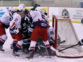 The Sherwood Park Crusaders and Brooks Bandits didn’t appear overly concerned with social distancing on Saturday night. Photo courtesy Target Photography