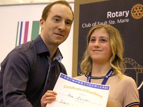 Dante Carlascio, co-chair of Rotary Science Fair Algoma, and Queen Elizabeth Public School student Ava Zwimmer, winner of United Steel Workers 2727 Judges' Award for individual merit at 31st annual Rotary Science Fair Algoma at Algoma University's George Leach Centre in Sault Ste. Marie, Ont., on Saturday, April 14, 2018. (BRIAN KELLY/THE SAULT STAR/POSTMEDIA NETWORK)