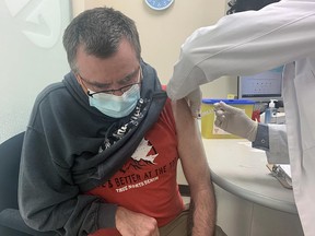 Reg Slimmon from Russell, Manitoba, stopped in for medical appointments in Portage la Prairie and decided to get his vaccine from the local Shopper's Drug Mart. The age eligibility for the AstraZeneca was dropped to 40, call your local pharmacist to find out more. (Aaron Wilgosh/Postmedia)