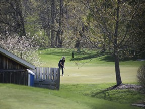 A golfer at The Bridges at Tillsonburg on Saturday, April 24, 2021. The course opened to the public despite an Ontario government restriction on outdoor recreation meant to curb the spread of COVID-19. (Kathleen Saylors/Woodstock Sentinel-Review)
