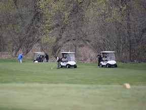 Golfers were on the green at The Bridges at Tillsonburg Sunday morning. Police were quiet on any enforcement action related to the course's opening, even as dozens of golfers were on the course for the second day in a row. (Kathleen Saylors/Woodstock Sentinel-Review)