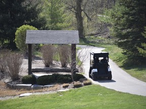 Golf course personnel at The Bridges at Tillsonburg on the course Saturday, April 24, 2021. The course opened despite provincial pandemic restrictions on outdoor recreation, and was fully booked Saturday. (Kathleen Saylors/Woodstock Sentinel-Review)