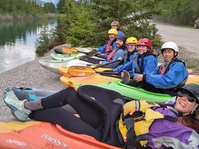 A Bow Valley Kayak Club group on the Zero to Hero kayak course geared up to paddle down the Bow River last summer June, 2020. Photo Robbie Mcavoy.