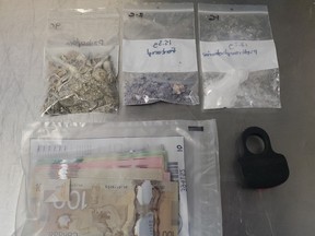 Suspected fentanyl, meth and psilocybin were seized, along with replica firearms and a prohibited weapon, after police executed a search warrant at a Sturgeon Falls residence on Monday.