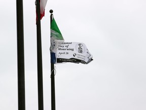 A flag commemorating the National Day of Mourning flies at North Bay City Hall, Wednesday. Michael Lee/The Nugget