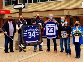 Some former NHLers lent moral support to Mike VanNetten, of Simcoe, and his family during a visit to the Health Sciences Centre in Hamilton this week. From left are Mike’s brother Kevin VanNetten, retired hockey pro Ryan Vandenbussche, of Vittoria, retired hockey pro Dave Hutchison, Norfolk farmer Todd Boughner, Mike’s father Jack VanNetten, Mike’s spouse Sarah VanNetten, and sister-in-law Cindy VanNetten. – Contributed photo