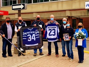 Some former NHLers lent moral support to Mike VanNetten, of Simcoe, and his family during a visit to the Health Sciences Centre in Hamilton this week. From left are Mike’s brother Kevin VanNetten, retired hockey pro Ryan Vandenbussche, of Vittoria, retired hockey pro Dave Hutchison, Norfolk farmer Todd Boughner, Mike’s father Jack VanNetten, Mike’s spouse Sarah VanNetten, and sister-in-law Cindy VanNetten. – Contributed photo