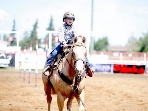 Hayes Smith of Silver Valley rides his horse during the pole -bending event at the Teepee Creek Junior Rodeo event at the Teepee Creek Stampede Grounds in 2019. After a one-year hiatus, the Teepee Creek Stampede will go ahead this July, with limitations in place.