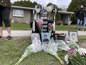 A dedication to Jeff Twain is seen on Jane Street, where family and friends gathered, Thursday afternoon, after the man accused in his death was released on bail earlier in the day. Ghislain Nsengiyumva, who is charged with second-degree murder and other offences, was arrested at approximately the same time as the protest began for breaching his release conditions. Michael Lee/The Nugget