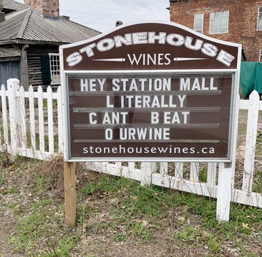 Sign wars among local businesses are lifting community spriits. Elaine Della-Mattia, The Sault Star.