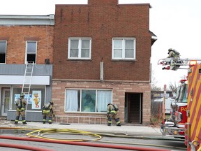 Firefighters respond to a call at 292 Wellington St. W., on Sunday, April 25, 2021 in Sault Ste. Marie, Ont. (BRIAN KELLY/THE SAULT STAR/POSTMEDIA NETWORK)