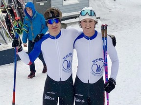 Max Mahaffy and Kendyn Mashinter pose for a photo in their Walden Cross-Country colours.