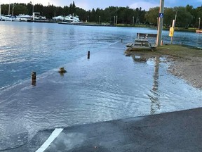 Flooding, like this at the Port Elgin waterfront last month, underscores the need for additional scientific studies of flood hazard limits and a beach dynamic assessment requested April 29 by the Saugeen Valley Conservation Authority as it processes a permit application from the Town of Saugeen Shores, on behalf of Cedar Crescent Village - a consortium of local businessmen with plans for a multi-million waterfront restoration on land leased from the Town for 50 years. [{Port Elgin Beach Preservers]