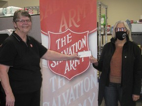Major Connie Armstrong of the Salvation Army (left) accepted a $3,000 cheque for the Port Elgin Food Bank from Michele Wake, president of the Women’s PROBUS Club of Saugeen Shores on behalf of its members and in celebration of PROBUS Month in April. [Supplied]