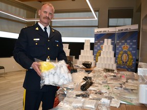 Insp. Mike Lokken, detachment commander for Parkland RCMP, stands in front of the largest quantity of drugs ever seized in the region. Parkland RCMP made the drug bust on April 10, following a lengthy investigation.