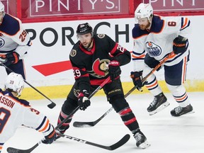 Photo courtesy NHL.com

Sault native Mike Amadio (centre) is surrounded by a trio of Edmonton Oilers in his first game as a member of the Ottawa Senators, on Apr. 8 in Ottawa.