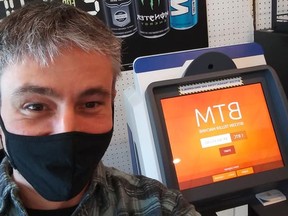 David Sheffield, whose company is managing a Bitcoin ATM in Owen Sound, stands with the new machine at Central Variety on 8th Street East. SUPPLIED