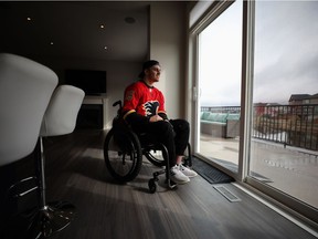 Injured Humboldt Broncos player Ryan Straschnitzki checks out the view from his family's home in Airdrie on April 27, 2019. After several months of renovations to the house Ryan and his family were able to move back in.