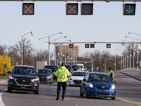 Ottawa police screen travellers entering Ontario from Quebec on the Champlain Bridge in support of public health orders issued by the Government of Ontario.