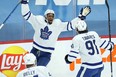 Toronto Maple Leafs forward Wayne Simmonds (left) celebrates his goal against the Winnipeg Jets with John Tavares (right) on Thursday night.