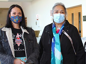 Indigenous Elder Loretta Parenteau-English, centre, conducted a traditional smudging ceremony to cleanse and purify the new COVID-19 immunization centre in Grande Prairie, which has the capacity to serve 1,300 clients a day. Here, Parenteau-English is shown with her helpers Leanna Willier, left, and Kelly Benning of the Grande Prairie Friendship Centre.