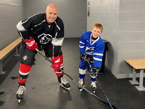 Arnie McFalls, left, of Chatham, Ont., and his son, Cameron, play hockey in Plano, Texas. (Contributed Photo)