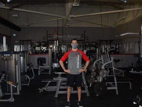 Josh Burnett alone inside his Owen Sound Fitness and Training business on Sunday, April 4, 2021. Burnett was forced to again close his business with the province's latest shutdown.