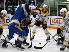 The Fort McMurray Oil Barons try to gain control of the puck infront of the Grande Prairie Storm's net during their game at the Casman Centre on Friday, February 21, 2020. Laura Beamish/Fort McMurray Today/Postmedia Network