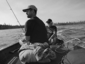 Filmmaker Jesse McCracken and his dad head out to a local fishing spot in this still from McCracken's documentary Grey Roads. SUPPLIED