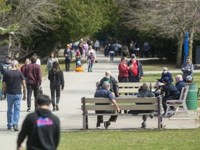 Even with a long lens compressing the image, there were undoubtably a lot of Londoners enjoying the sunshine in Springbank Park in London, Ont. on Sunday, April 4, 2021. As the province entered another lockdown amid rising outbreaks, Jane Sims is frustrated the province has vaccine doses it is not distributing. Mike Hensen/The London Free Press