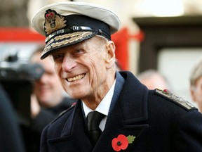 Britain's Prince Philip smiles during a service at the Field of Remembrance at Westminster Abbey in London, Nov. 8, 2012.