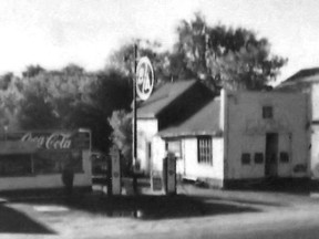 Arthur Davey and his wife Roxie moved to Norwood in 1942. Arthur brought his car dealership to the village and over the years grew his business to include the dealership, a garage, gas pumps and a snack bar. DaveyÕs Garage, pictured in September of 1957 was located on the site of the present day Norwood Post Office on Highway #7.