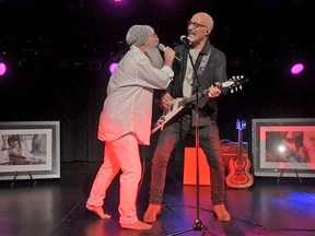 Belleville's Andy Forgie and Mark Rashotte perform Beatles songs March 5 during Belleville Downtown DocFest's gala.