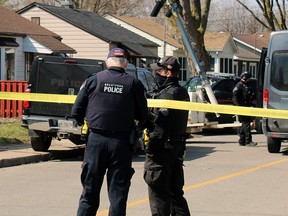 Police remain at a Grey Street house on Wednesday, the fourth day of a standoff with man they say is in crisis. Roads in the area of Grey and Maitland streets are blocked to vehicular and pedestrian traffic.